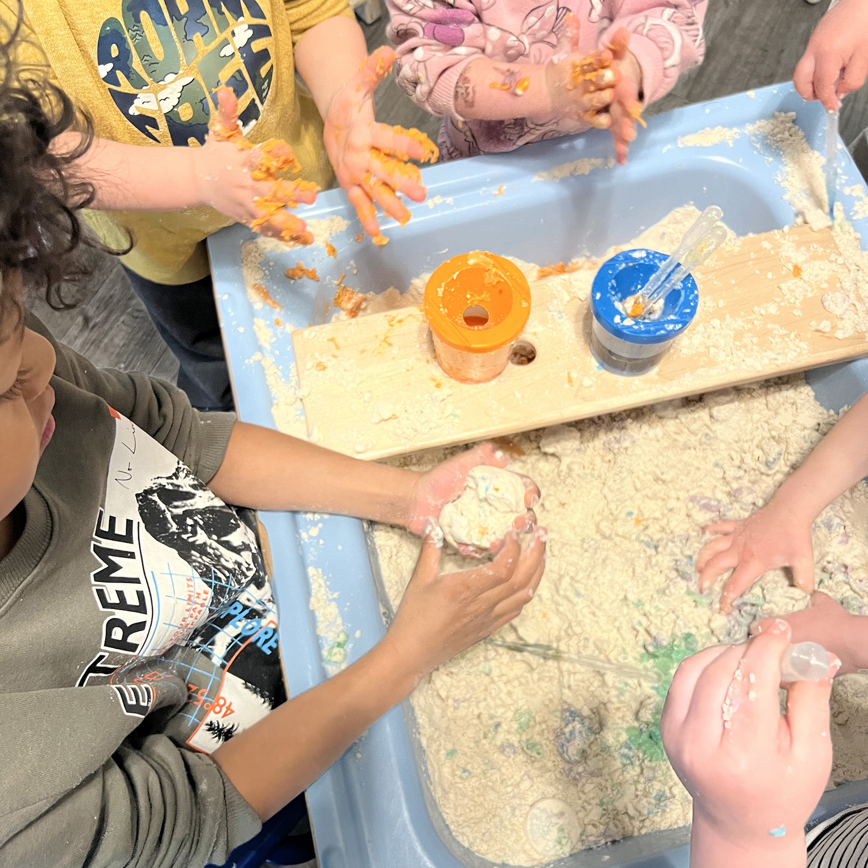 Kids Play in Sensory Bin